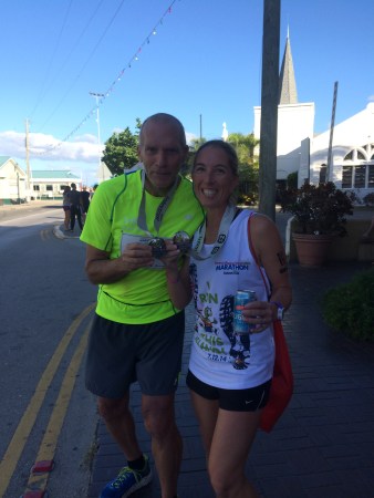 Hanging with Bart Yasso at the finish line of the Cayman Islands Half Marathon