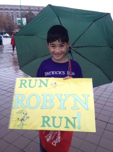 Kiernan holds the sign he made for me