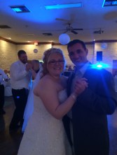 Kristi on her wedding day, dancing with my husband Chris.