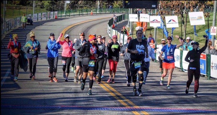Ken runs to the finish of his first marathon. 